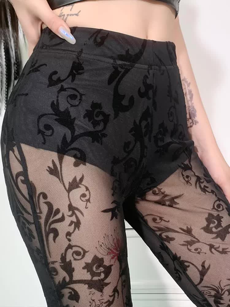 Pantalon gothique punk rave cybernetic noir avec motif baroque en velours sur tulle transparent, vue détail côté et taille élastique