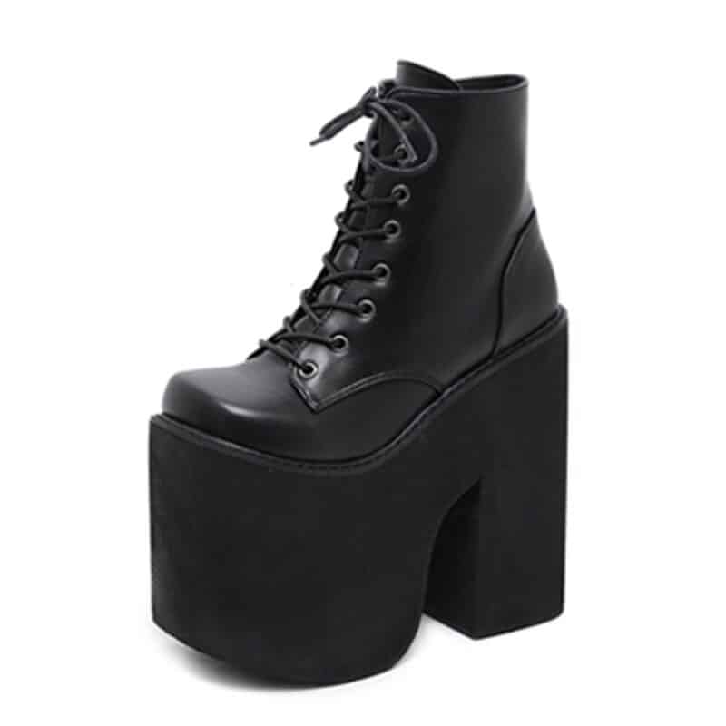 Chaussure gothique punk compensée noire en cuir avec lacets et plateforme épaisse vue de profil